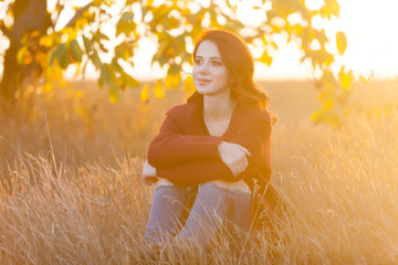 Woman sitting on the grass