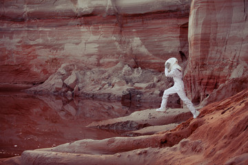 Wall Mural - Water on Mars, futuristic astronaut, image with the effect of
