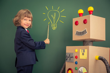 Poster - Kid with toy robot in school