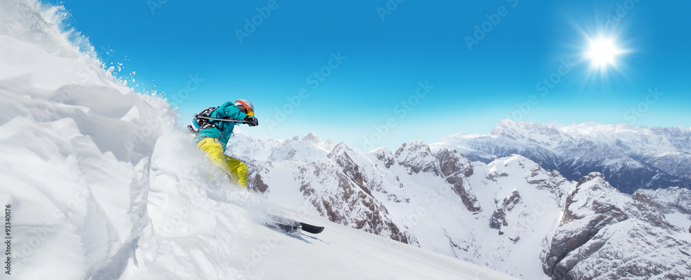Man skier running downhill - obrazy, fototapety, plakaty 