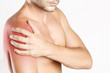 © triocean - Studio shot of young man with shoulder pain