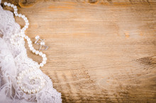 Lace, Pearl Necklace, Earrings On Wooden Background, Rustic
