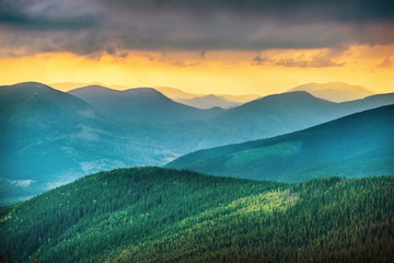 Wall Mural - sunset over blue mountains