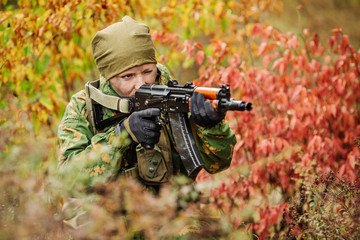 Wall Mural - russian soldier in the battlefield with a rifle