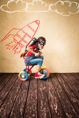 Canvas Print - Kid playing with jet pack at home