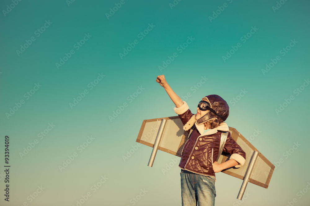 Happy child playing with toy airplane Stock Photo | Adobe Stock