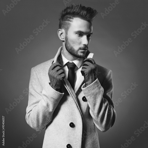 Fototapeta na wymiar Handsome stylish man in autumn coat