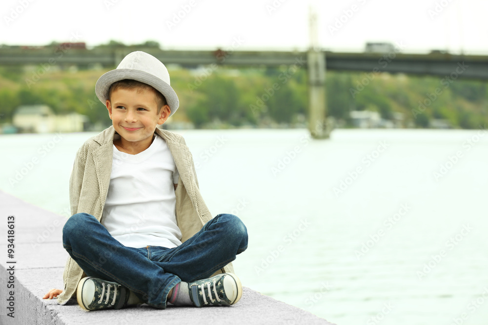 Little boy on the riverside