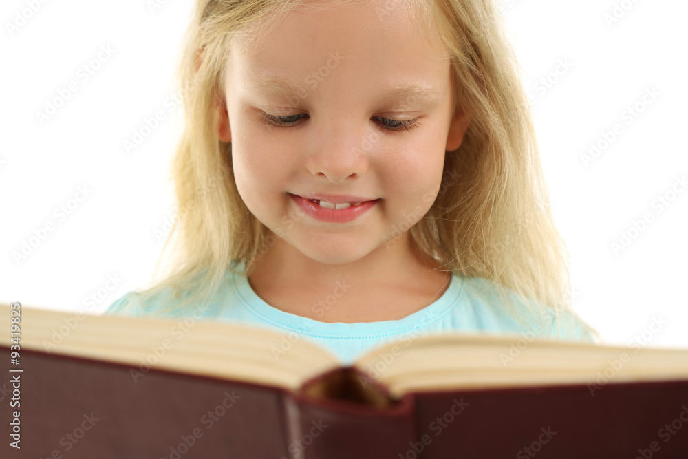 Beautiful little girl with book, isolated on white