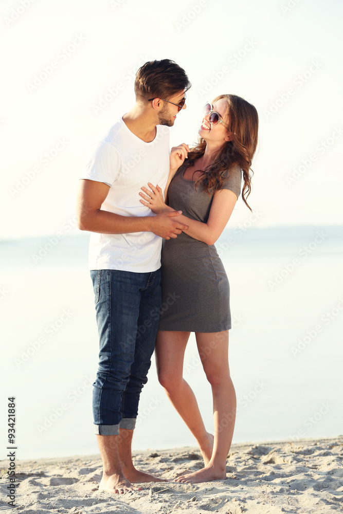 Young couple on the riverside
