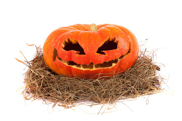 Halloween pumpkin on hay