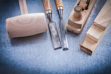 Composition of joinerâs tools on metallic background construct