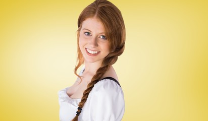 Wall Mural - Composite image of oktoberfest girl smiling at camera