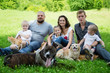 Happy family with dogs and cat