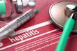 Hepatitis. Medical Concept on Red Background.