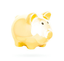 Golden piggy bank isolated over a white background