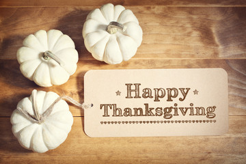 Canvas Print - Happy Thanksgiving message with small white pumpkins