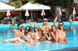© Africa Studio - Young people having fun in the swimming pool