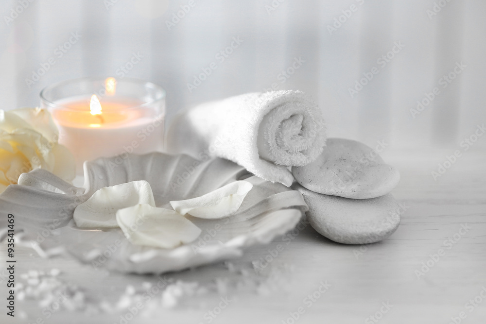 Beautiful composition of spa treatment on wooden table