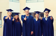 © Syda Productions - group of smiling students in mortarboards