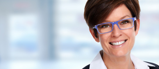 Wall Mural - Face of mature business woman with eyeglasses.