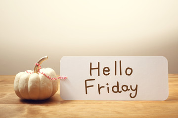 Wall Mural - Hello Friday message with small pumpkin