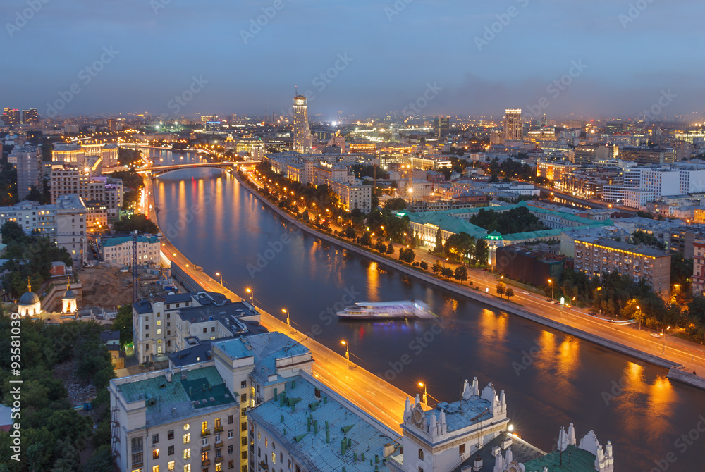 The evening city of Moscow from a tall building on the embankment of the river - obrazy, fototapety, plakaty 