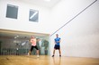 © WavebreakmediaMicro - Couple playing a game of squash