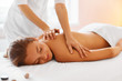 canvas print picture - Spa treatment. Woman enjoying massage in spa centre.