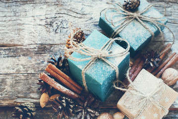 Holiday Boxes with Linen Cord, Cinnamon, Pine cones, Nuts. Toned