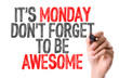 Hand with marker writing: Its Monday Don't Forget to be Awesome