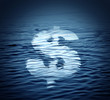 Dollar symbol drifts on the water. Economic crisis concept.