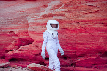 Wall Mural - futuristic astronaut on crazy pink planet, image with the effect