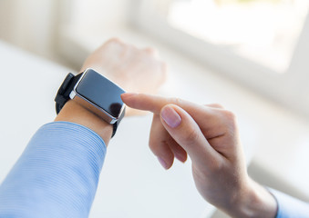 Poster - close up of hands setting smart watch