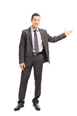 Canvas Print - Cheerful businessman gesturing with his hand