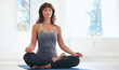 © Jacob Lund - Fitness female practicing Padmasana at gym