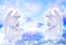 Two Praying Angels With Rays Of Light Over Blue Sky With Stars