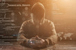 © Glebstock - hacker at work with graphic user interface around