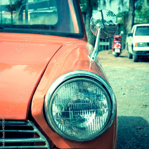 Naklejka nad blat kuchenny close-up headlight of colourful classic car