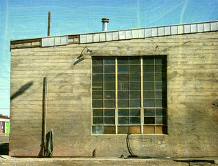 old and worn vintage industrial building and window