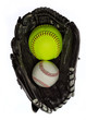  Softball and baseball in a glove. Clipping path included
