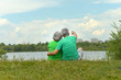 © aletia2011 - Senior couple sitting near lake