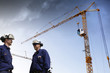 building workers under a construction-crane, building-industry