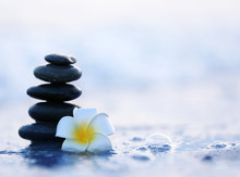 Spa Stones With Flower On Sea Beach Outdoors