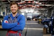© Nejron Photo - Cheerful serviceman in a car workshop