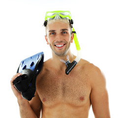 Canvas Print - Young man with swimming mask or goggles with flippers, isolated on white