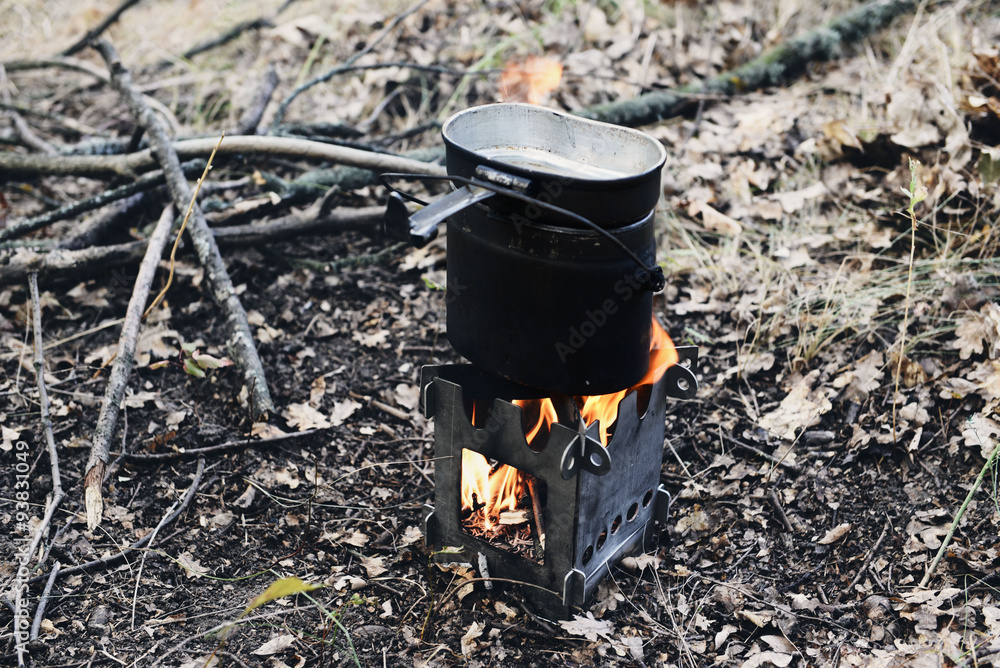Kettle on fire in the forest
