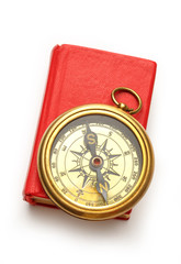 Wall Mural - Red closed book with retro compass