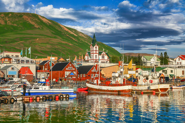 historic town of husavik at sunset, iceland