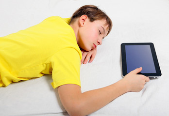 Wall Mural - Kid sleep with Tablet Computer